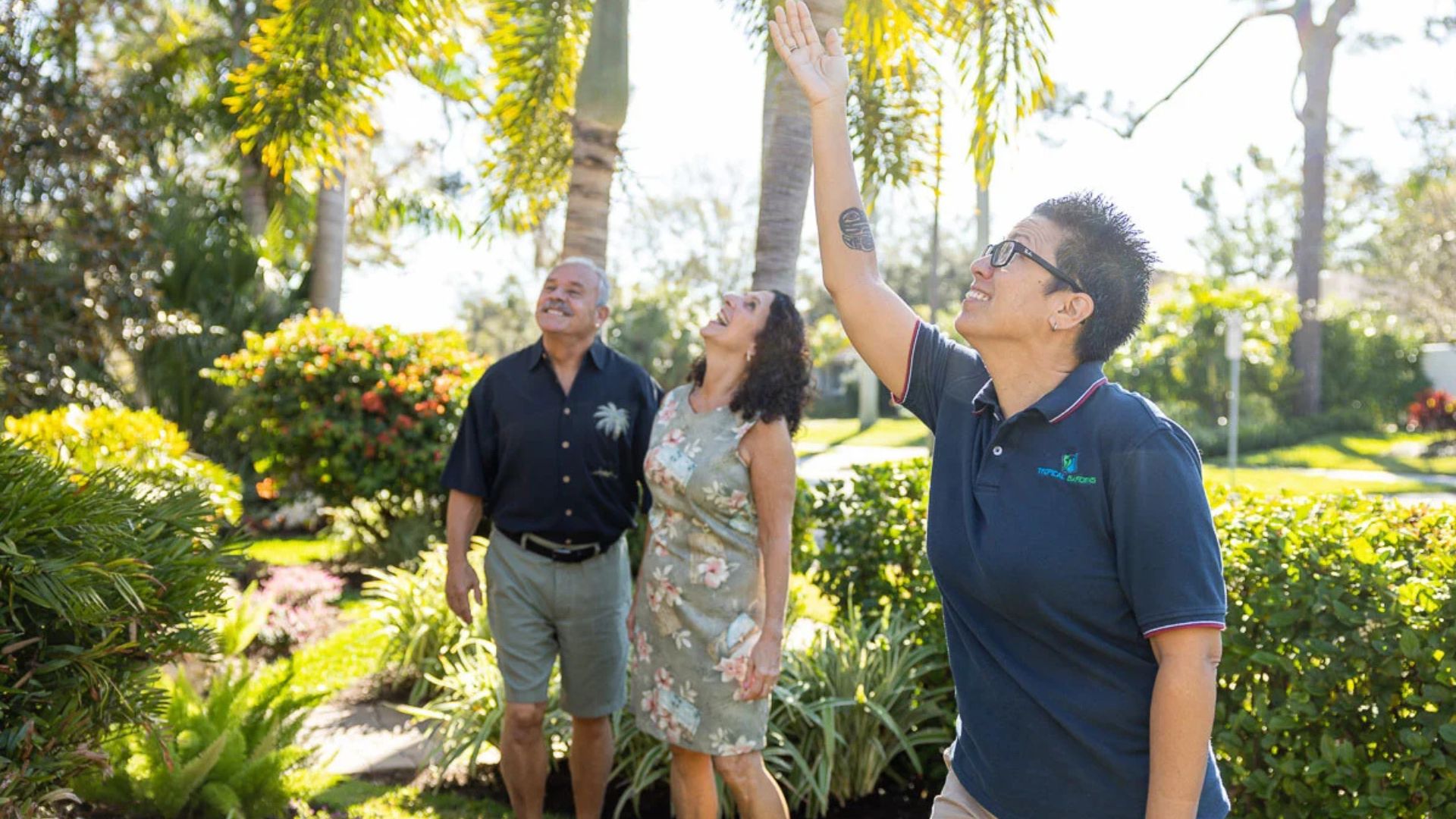 Homeowner consulting landscape design expert for outdoor transformation