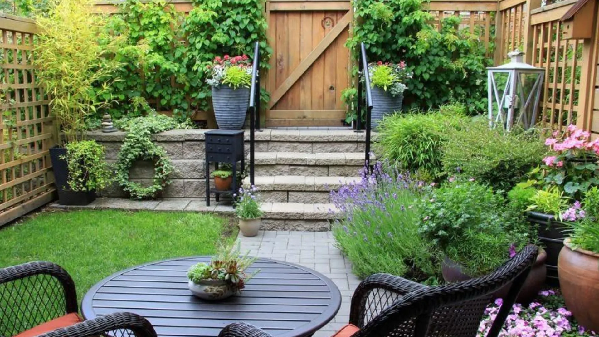 Small yard landscape design ideas showing compact backyard with patio, plants, and space saving layout