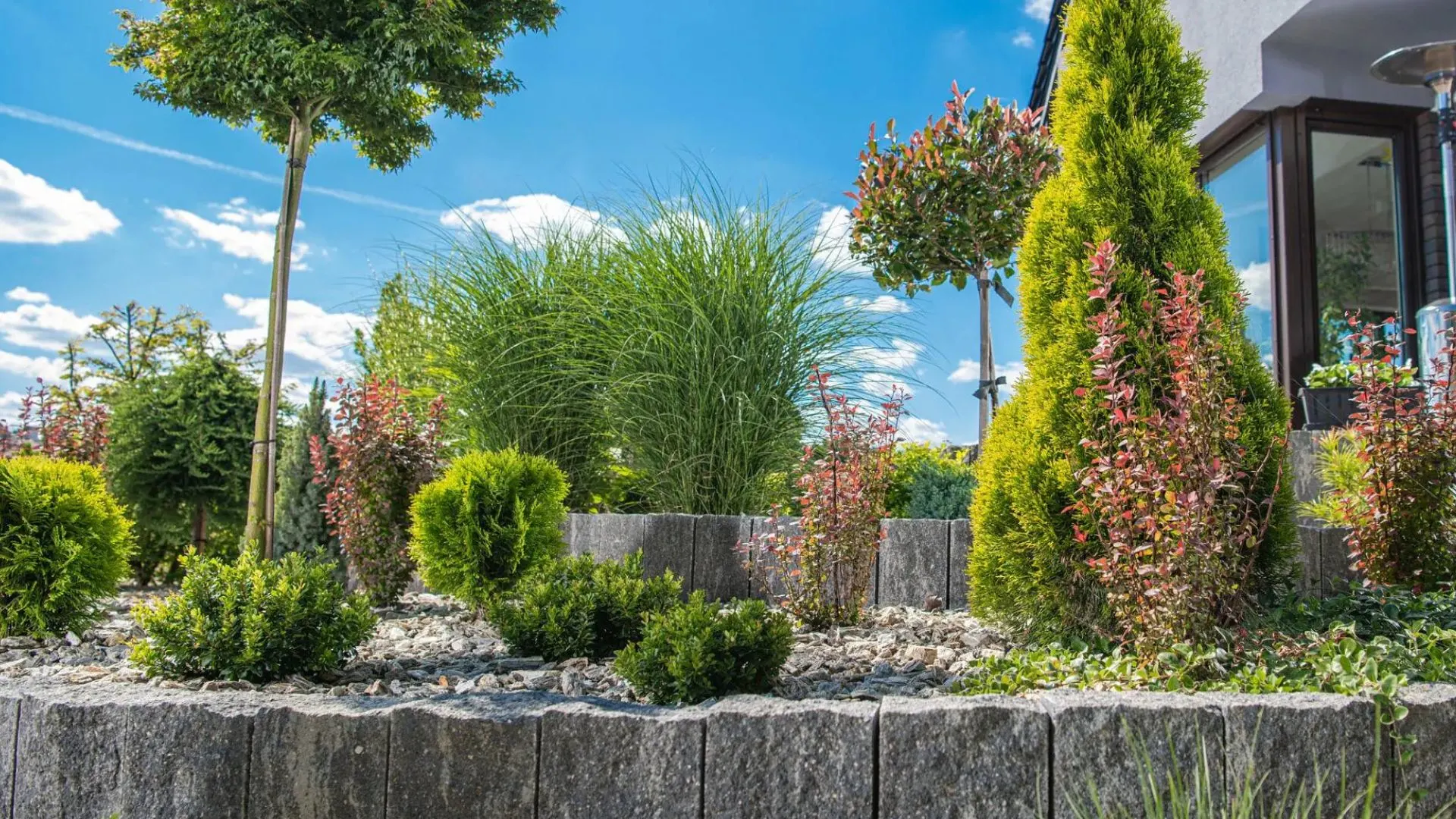 Modern vs traditional landscaping comparison showing clean minimalist yard and lush classic garden design