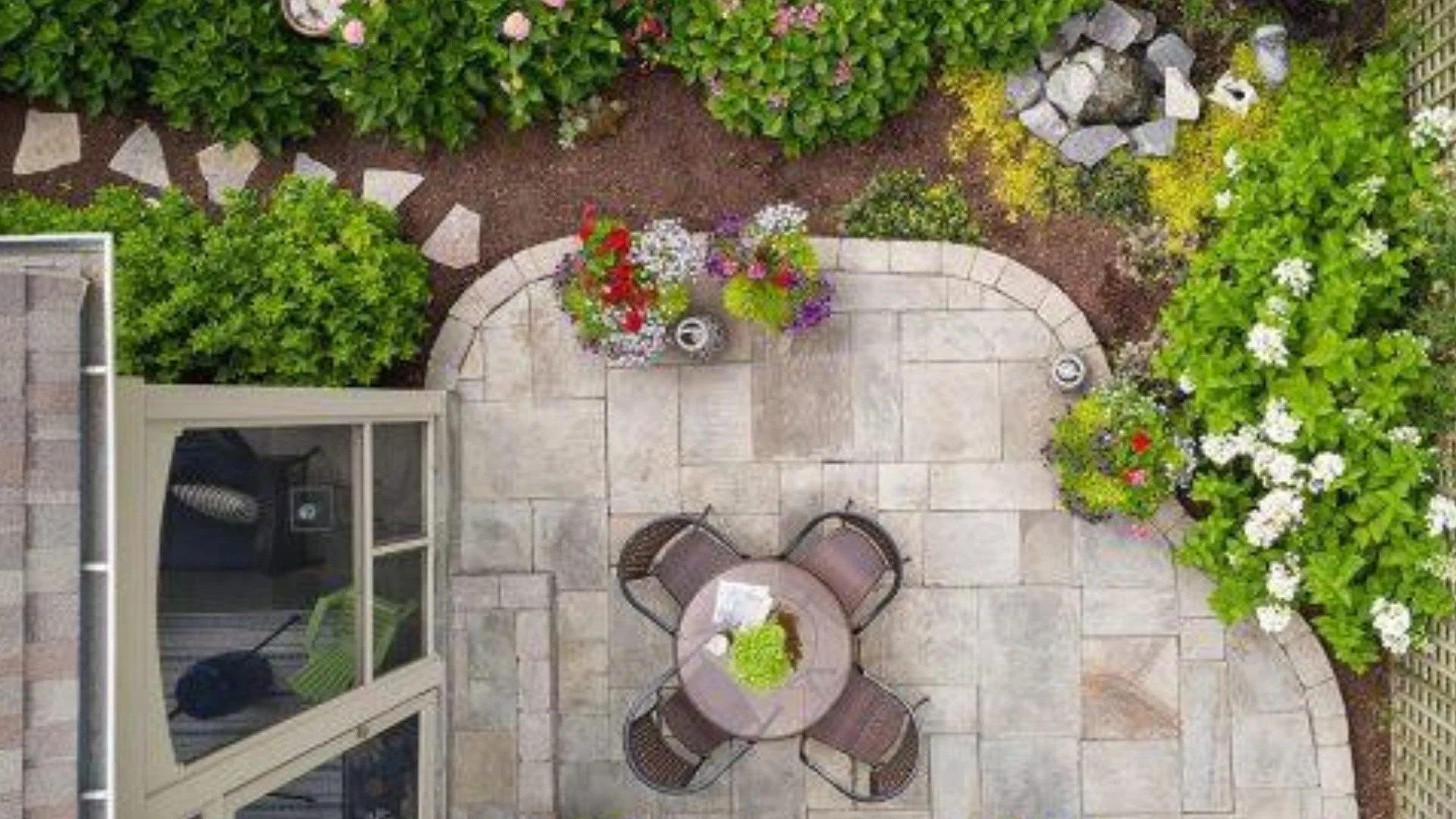 Small yard zoning layout showing seating area, planting zone, and pathway design